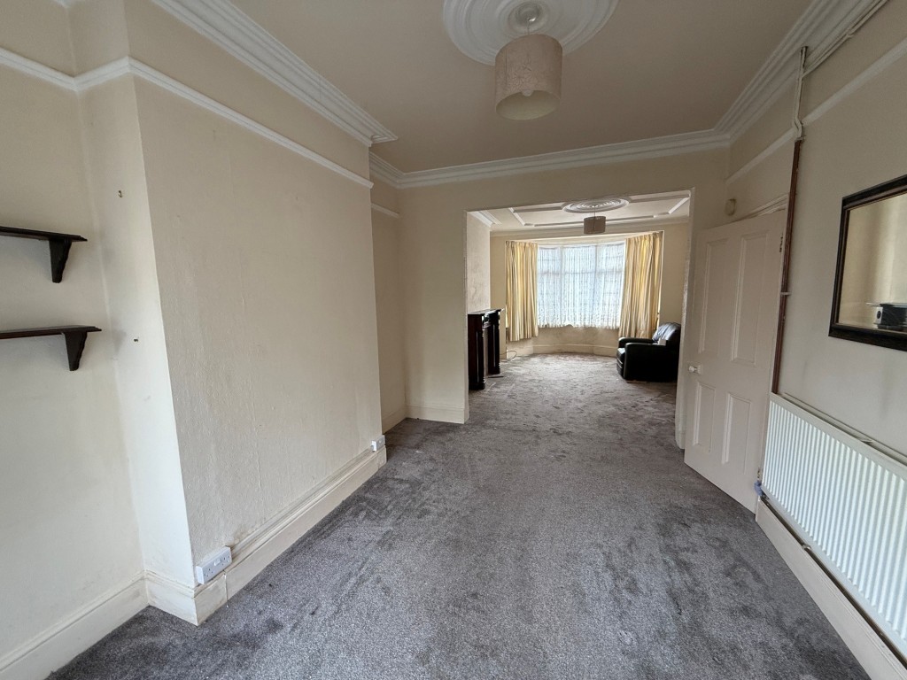 Lot: 142 - THREE-BEDROOM MID-TERRACE HOUSE FOR IMPROVEMENT - Living room - view 2